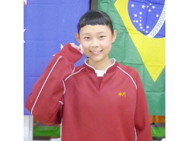 小学生クラスで英検合格を喜ぶ子どもたちの笑顔